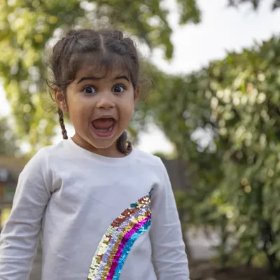 Small child shouting with joy