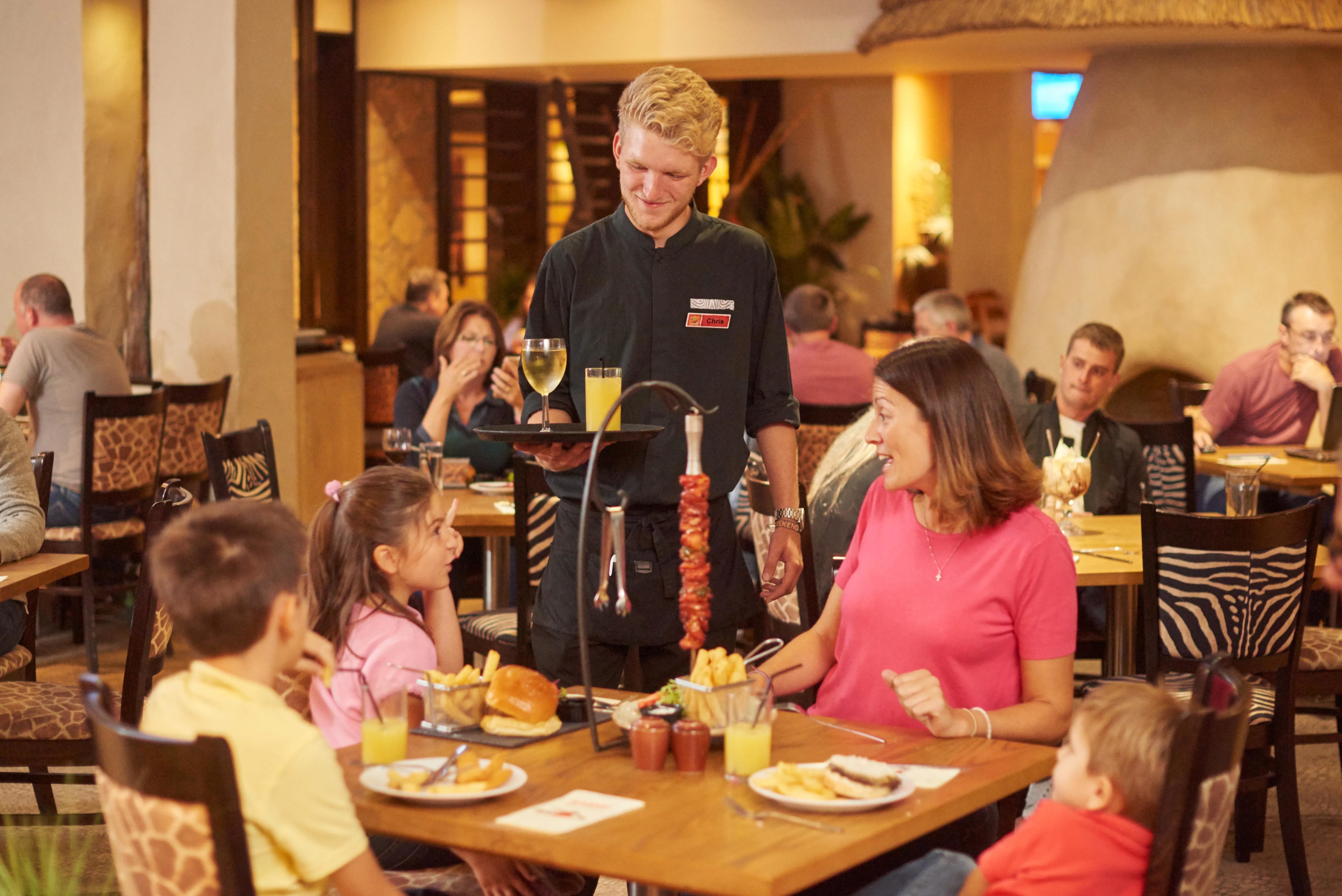 Family at a table at The Zafari Bar And Grill 