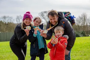 Family showing their Premium Merlin Annual Passes