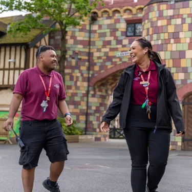 Chessington World of Adventures members of staff walking and smiling