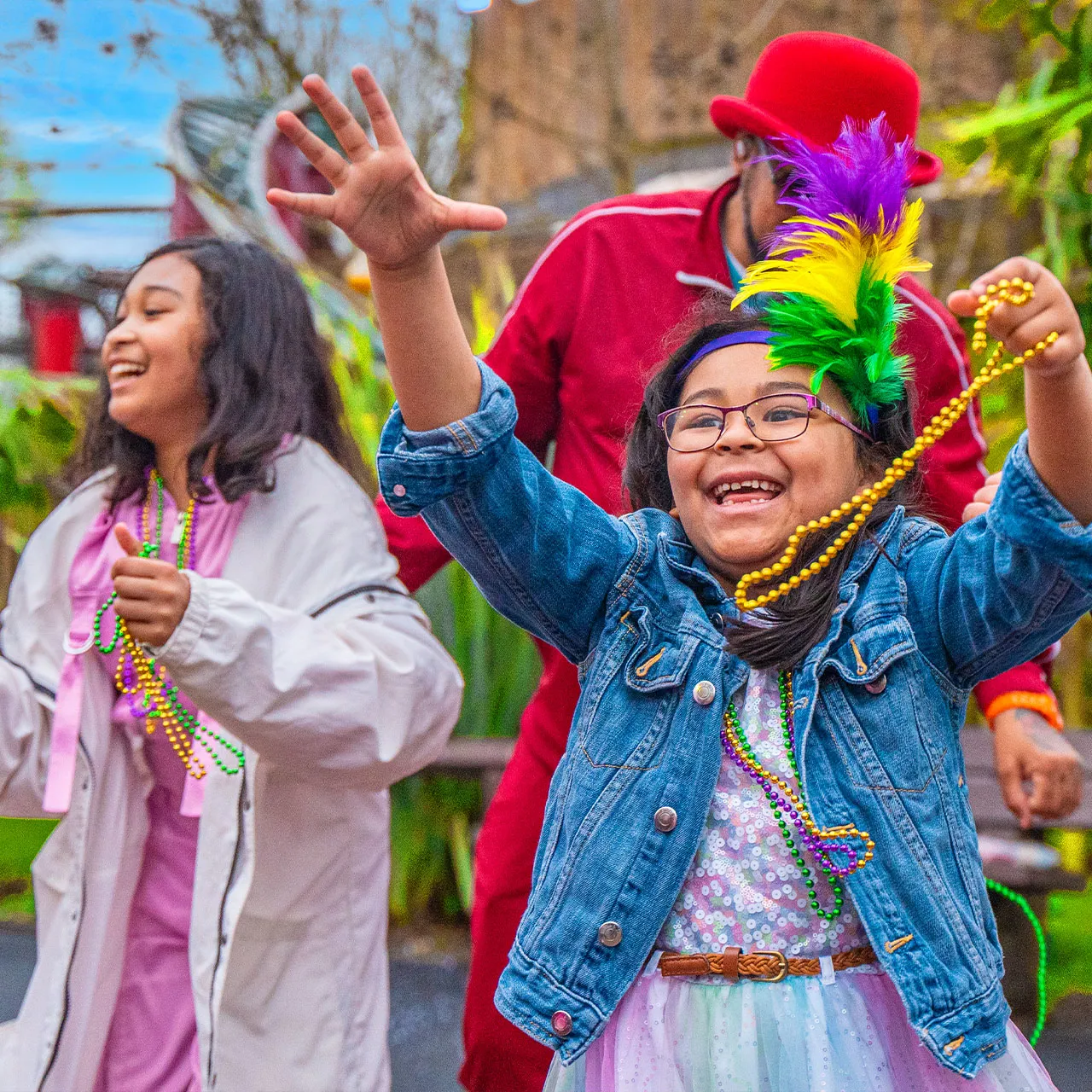 Children jumping at Mardi Grrra!