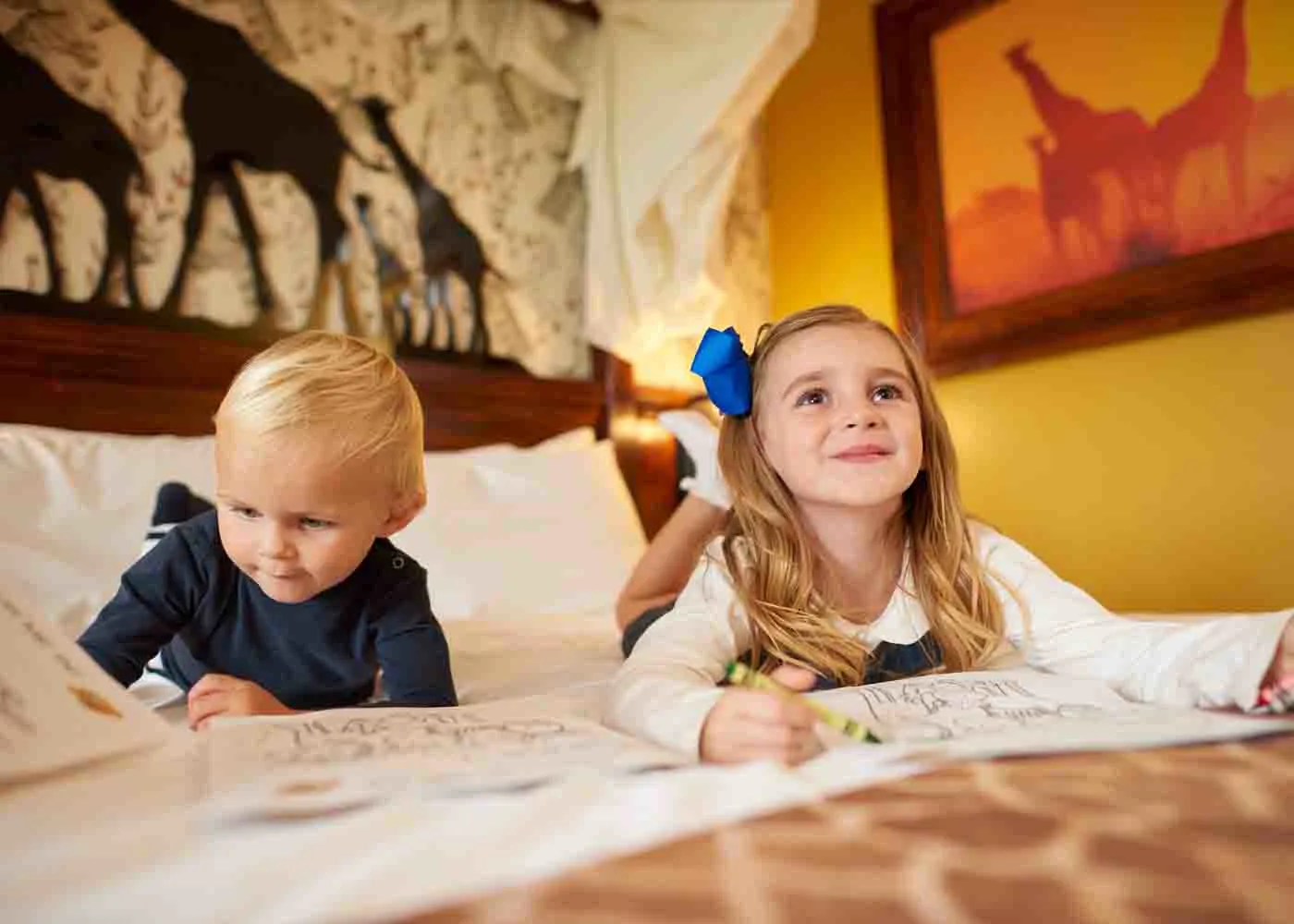 Children colouring in a book in the Giraffe Room at Chessington World of Adventures Resort